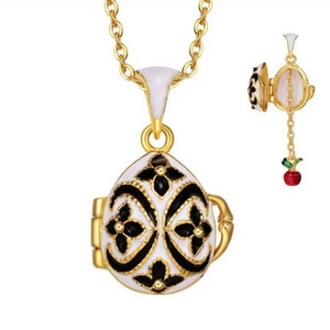 Fabergé Style Egg Pendant 4 Leaf Clover opening onto Apple from the Garden of Eden with its Chain.