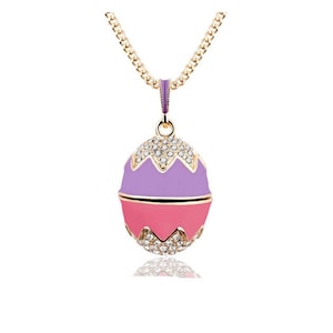 Two-tone Fabergé Style Egg Pendant Purple and Pink. Many Crystals with its Gold plated chain.