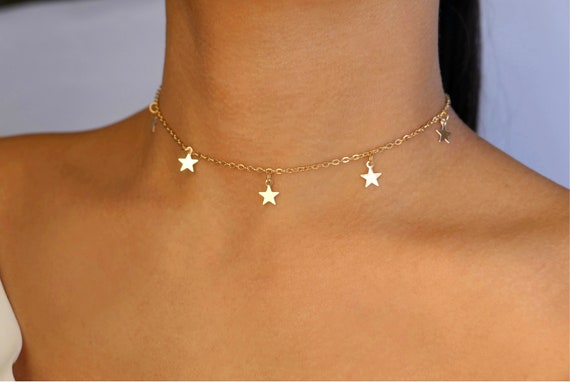 Gold stars charm best sale choker