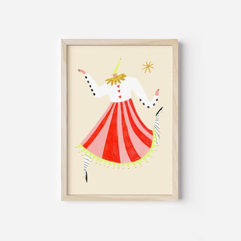 May include: A framed illustration of a headless figure in a red and pink striped skirt with a white top and a yellow crown. The figure is dancing with one leg raised and a black and white striped stocking on the other leg. The background is a light yellow.