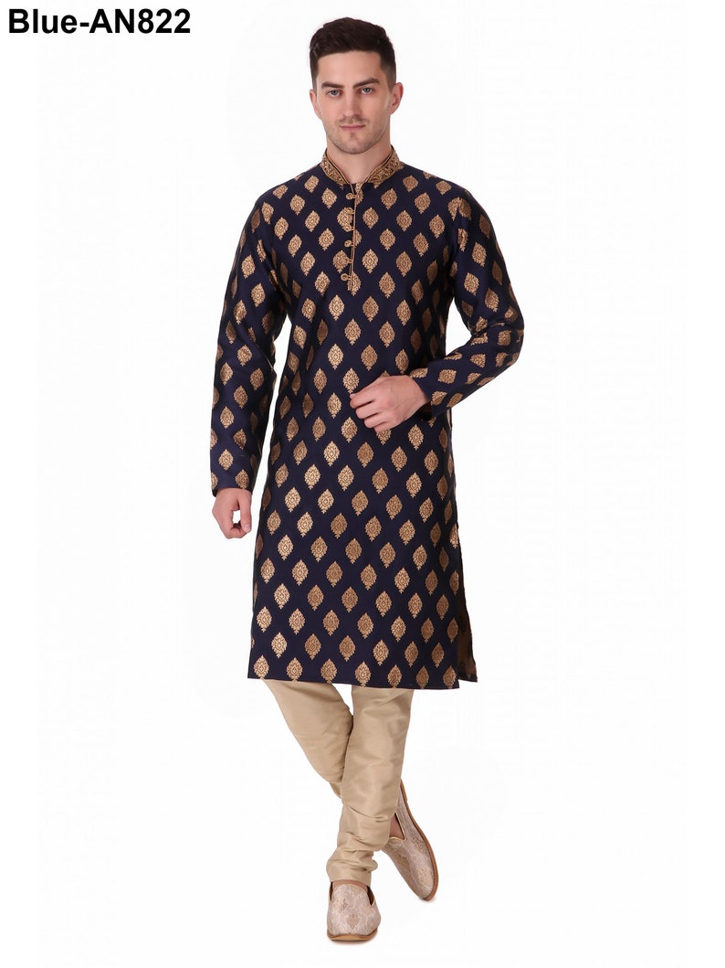 May include: Navy blue kurta pajama set with gold diamond pattern. The long-sleeved kurta features a mandarin collar with gold embroidery. The matching pajama pants are a light beige color. The text "Blue-AN822" is in the top left corner.