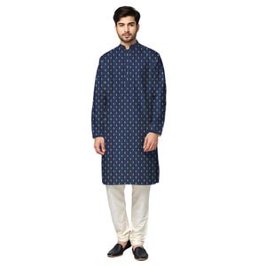 May include: A navy blue kurta with a repeating yellow pattern, paired with off-white pants and black shoes. The long-sleeved kurta features a mandarin collar. The outfit is a traditional Indian style.