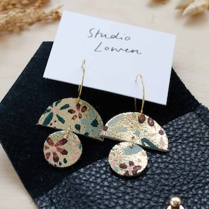 Sunrise Hoop Earrings made from recycled leather. Lightweight statement floral charm earrings.