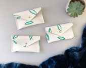 Recycled leather card holder, turquoise and gold botanical leaf business card case. Banana leaf business card wallet