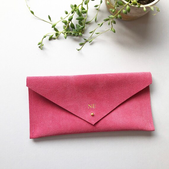 pink suede clutch