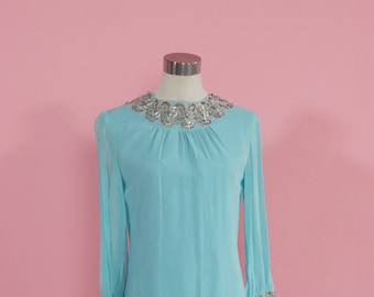 60s pastel Blue mini dress with zip back closure with silver detail