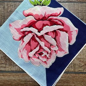 Vintage 1940s Linen Pink ROSE Hankie on a blue background with a hand rolled hem
