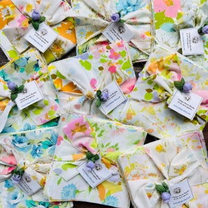 Vintage Sheets charm pack bundle. Each colorful bundle has 42 squares cut from vintage sheets.