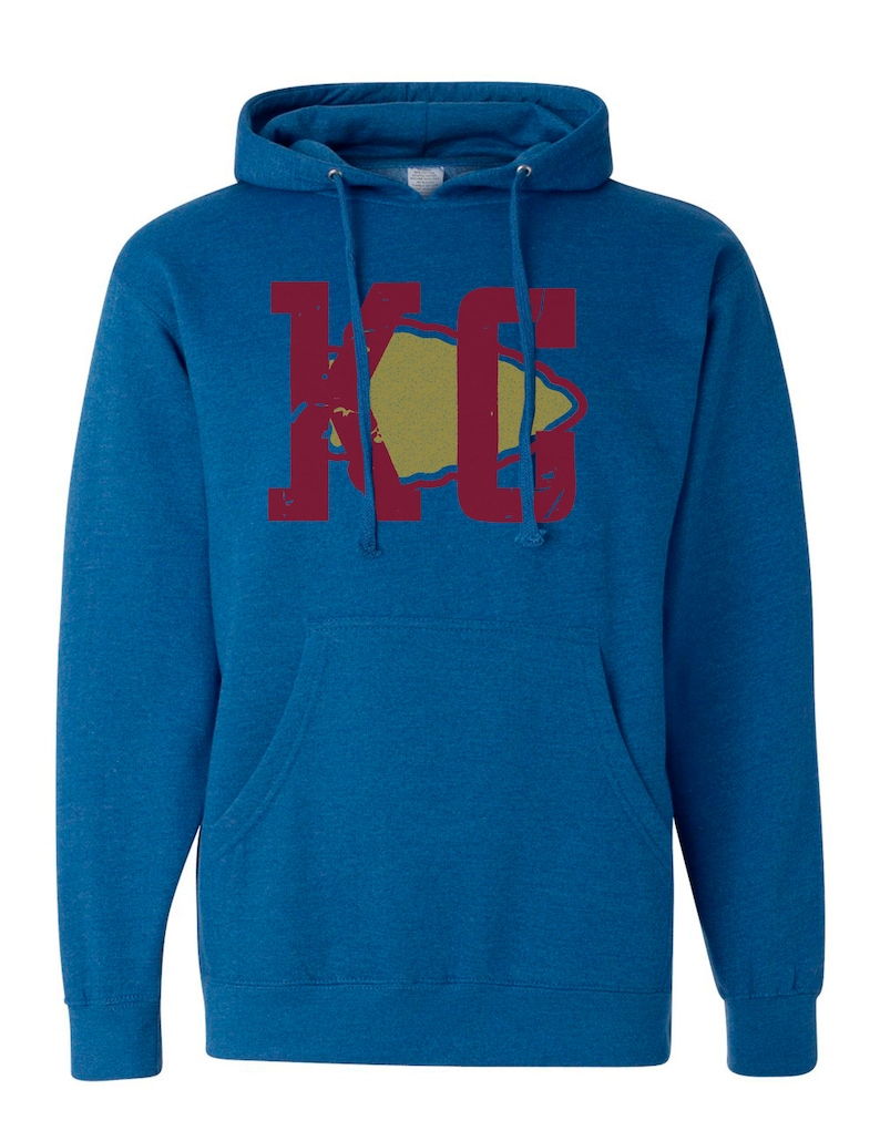 May include: A blue hooded sweatshirt with a red and yellow graphic of the letters "KC" with a stylized arrowhead shape.