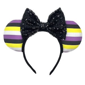 May include: Black and yellow striped mouse ears with a black sequined bow.