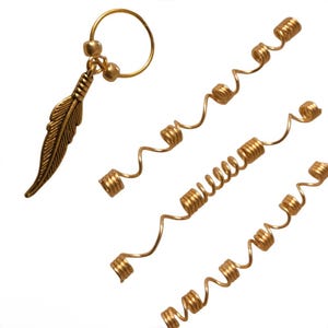 May include: Gold-colored hair accessories. One piece features a feather charm and a ring. The other pieces are spiral-shaped hair coils. The accessories are designed to be used as hair jewelry.