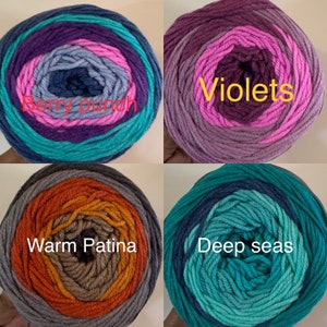 May include: Four skeins of yarn in different color combinations. The skeins are labeled "Berry Punch", "Violets", "Warm Patina", and "Deep Seas".