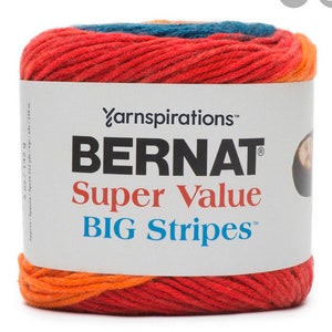 May include: A ball of Bernat Super Value Big Stripes yarn in a red, orange, and blue color scheme. The yarn is made by Yarnspirations.