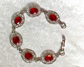 Silver Link Ruby Red Colored BraceletBenefits Charity