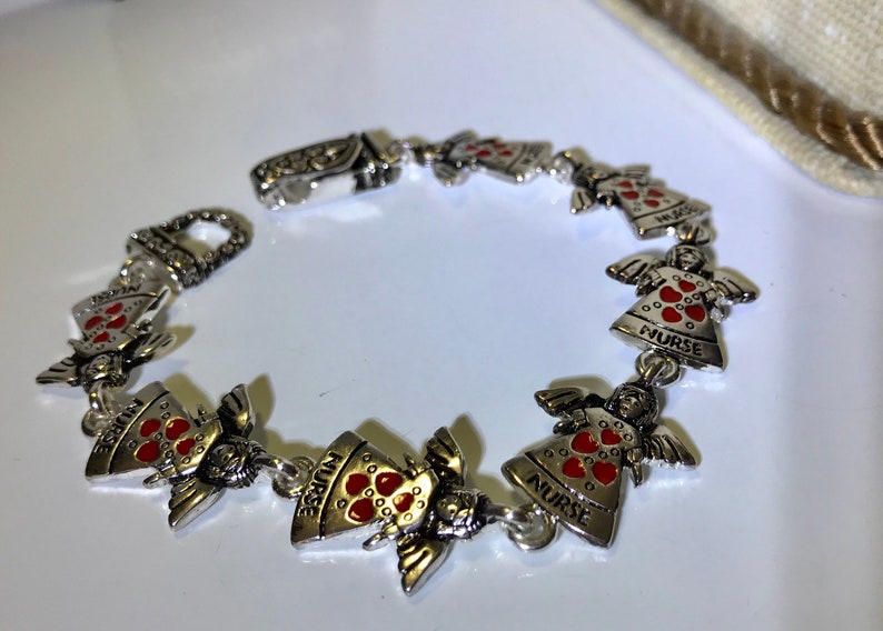 Angel Nurse Hearted Silver Bracelet with Loop ClaspBenefits Charity