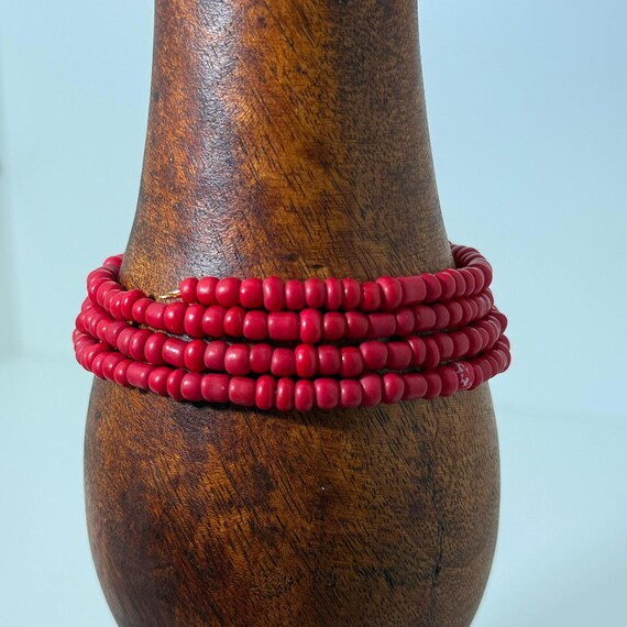 Memory wire wrap bracelet with red beads