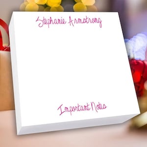 May include: White notepad with the name "Stephanie Armstrong" written in pink cursive at the top and "Important Notes" written in pink cursive at the bottom.