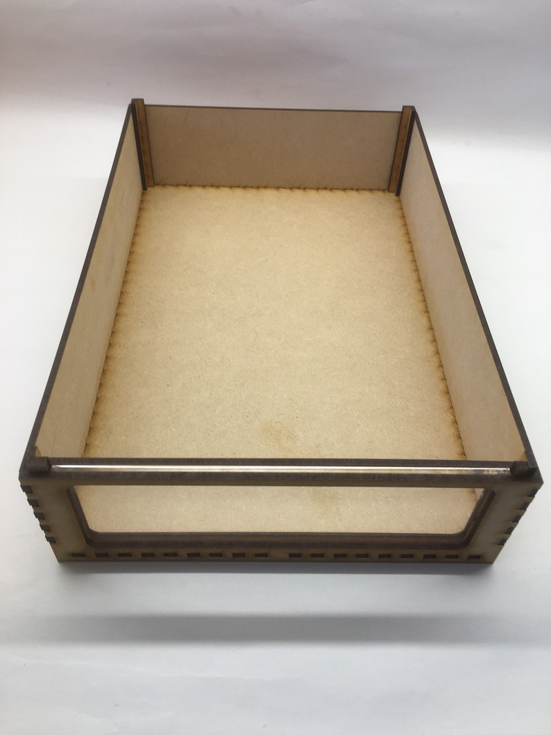 May include: A wooden box with a clear plastic window on the front. The box is made of unfinished wood and has a natural brown color.