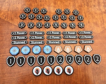Keyforge compatible matt black acrylic tokens.