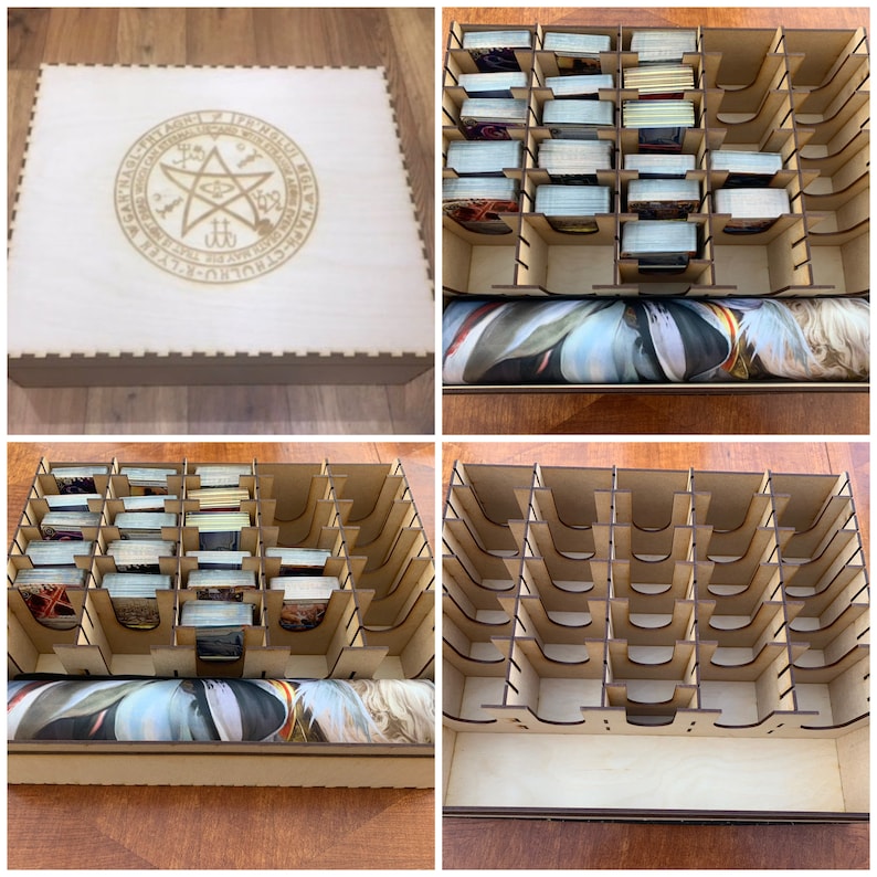 May include: A wooden box with a lid featuring a five-pointed star with a circle around it. The circle has the text "The Ancient Ones" and "The Great Old Ones" written around the star. The box has a removable insert with compartments for storing cards. The insert has a brown and white pattern.