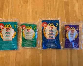 Set of 4 McDonalds Happy Meal Toys Ty Beanie Babies 1-4: Freckles the Leopard,Antsy the Anteater,Smoochy the Frog,Spunky the Cocker Spaniel