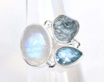 Anillo hecho a mano de plata de ley con piedra lunar, aguamarina y topacio azul.