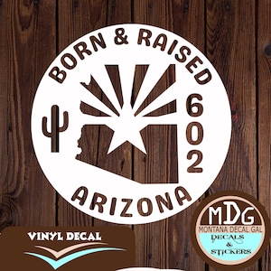 May include: White vinyl decal with the text "BORN & RAISED 602 ARIZONA" in a circular design. The design includes a cactus, the state outline, and a star. The words "VINYL DECAL" are at the bottom.
