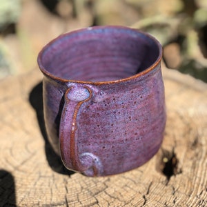 A mug. Before and after kiln. Using electric brown clay and smokey merlot  glaze. Very pleased with the way it turned out. Enjoy :) : r/Pottery