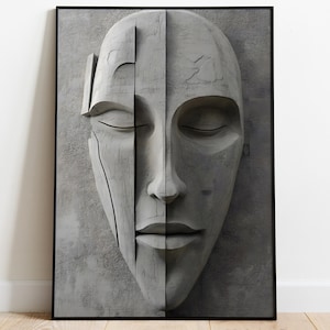 Puede incluir: Una escultura abstracta gris y blanca de un rostro con los ojos cerrados, enmarcada.