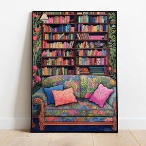 May include: A colorful floral patterned couch with two pillows sits in front of a bookshelf filled with books. The bookshelf is flanked by leafy vines with pink flowers.