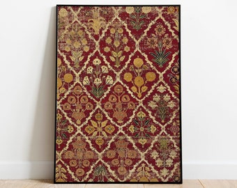 May include: A framed print of a vintage rug with a red background and a repeating pattern of gold and green floral motifs.