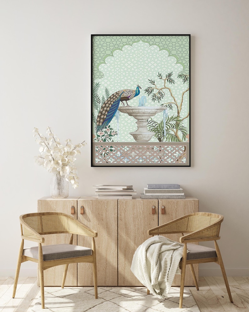 May include: A framed print of a peacock standing by a fountain in a green and brown garden with a decorative archway. The print has a green background with a geometric pattern.
