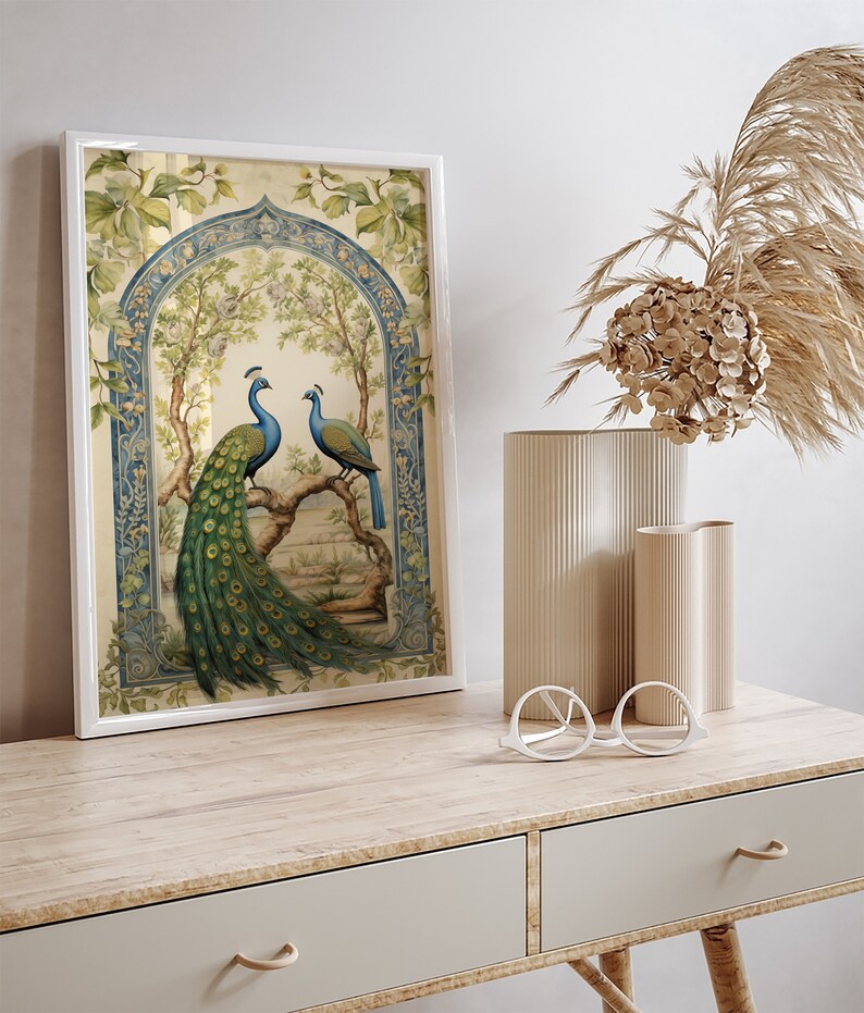 May include: A framed print of two peacocks in a blue and green archway with a floral background.