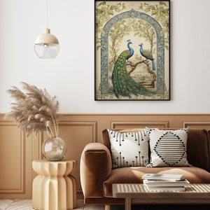 May include: A framed vintage illustration of two peacocks perched on a branch in a garden setting. The peacocks are depicted in shades of blue, green, and gold, with intricate details in their feathers. The background features a decorative archway and lush foliage.