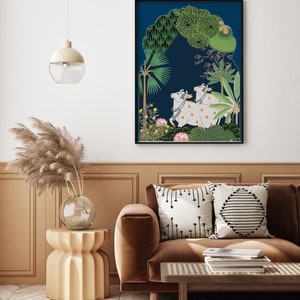 May include: A framed illustration of two white cows with orange markings standing in a lush green forest with a blue background. The cows are adorned with floral garlands. The forest is depicted in a stylized manner with palm trees and other tropical plants.