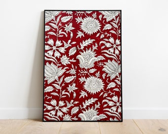 May include: A framed print with a red background and a white floral pattern. The pattern features stylized flowers and leaves.