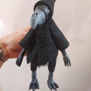 crow art doll