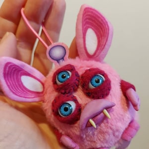 All-seeing Cursed Furby plush
