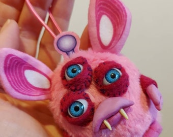 All-seeing Cursed Furby plush