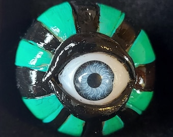 Spilla con l'occhio che tutto vede