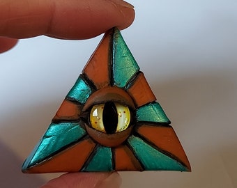 Spilla con l'occhio che tutto vede