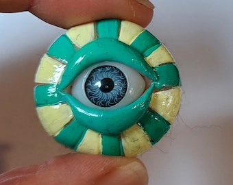 Spilla con l'occhio che tutto vede