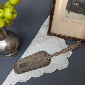 Antique, silver-plated cake server from Austria. Vintage.