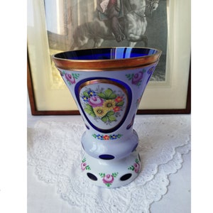 Glass vase blue and white with an effective play of colors. Bohemian glass, vintage