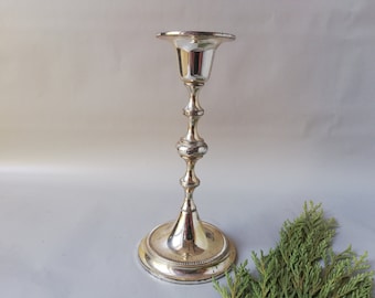 Silver-plated candlestick as a table decoration, vintage candle holder for contemplative hours