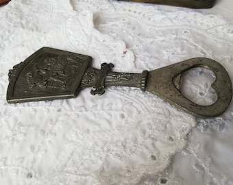 Pewter bottle opener with medieval lute player. Vintage Germany.