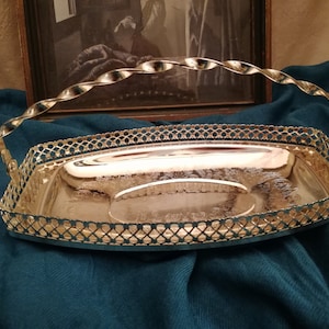 Silver-plated serving bowl with floral engravings. Vintage from Austria