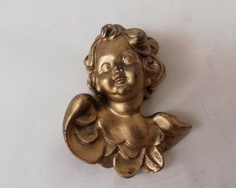 Handmade, gold-plated angel's head in baroque style with wings made from an Austrian manufactory.