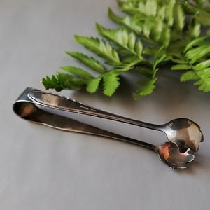 Antique silver sugar cube tongs from Austria. Vintage