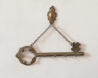 Brass keychain in the shape of a key. Vintage from Austria.
